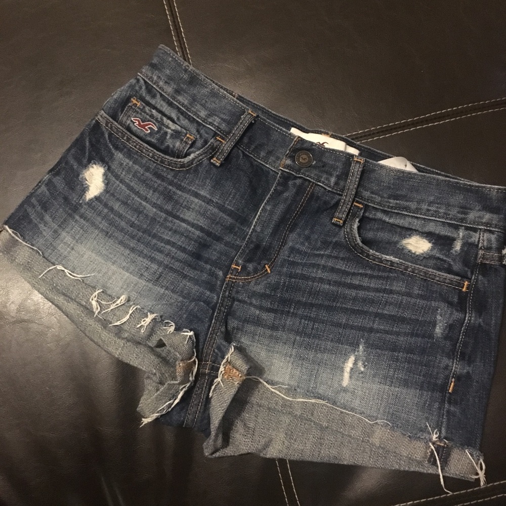 High waisted softly distressed medium wash shorts